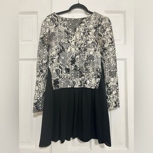 Woman’s python print white and black dress